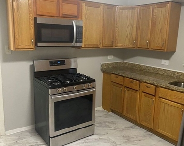 7637 S Essex Avenue - Photo Thumbnail 1