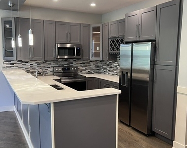 1208 E 64th Street - Photo Thumbnail 3