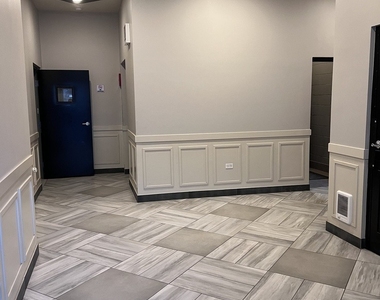 1208 E 64th Street - Photo Thumbnail 2