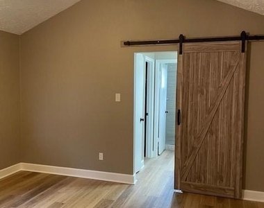 1314 Oak Hollow Drive - Photo Thumbnail 4