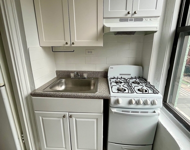 E 58th St - Photo Thumbnail 5