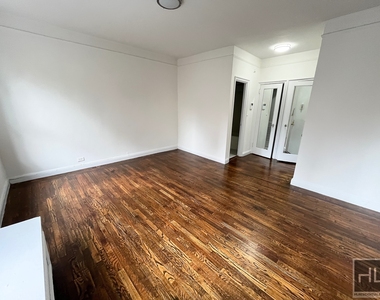 E 58th St - Photo Thumbnail 1