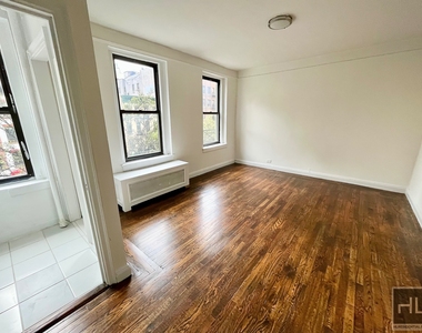 E 58th St - Photo Thumbnail 2