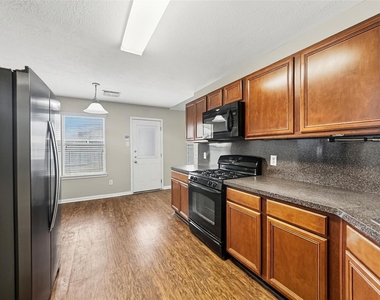 8302 Hardy Elm Street - Photo Thumbnail 1