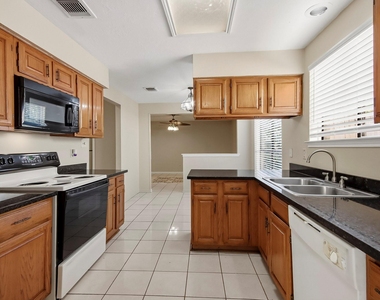 8807 Lakeside Forest Drive - Photo Thumbnail 6