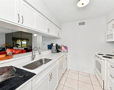 217 Airport Avenue W - Photo Thumbnail 4