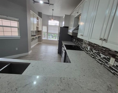 14300 Tambourine Drive - Photo Thumbnail 9