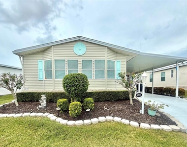 8713 E 28th Avenue - Photo Thumbnail 1