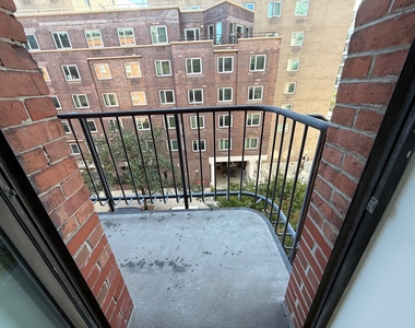 201 East 12th Street - Photo Thumbnail 3