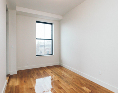 55-27 Myrtle Ave - Photo Thumbnail 13