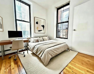 370 West 52nd Street - Photo Thumbnail 1