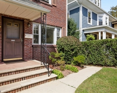 209 Academy St - Photo Thumbnail 1