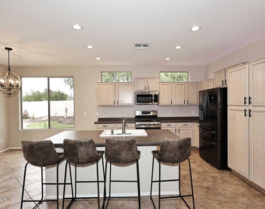 6027 W Oberlin Way - Photo Thumbnail 13