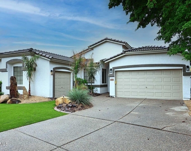 6027 W Oberlin Way - Photo Thumbnail 1