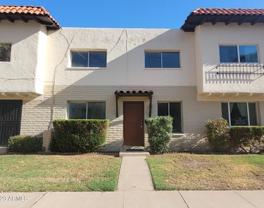 4667 N 21st Avenue - Photo Thumbnail 1