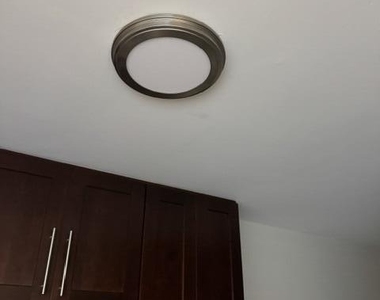 8801 Wiles Road - Photo Thumbnail 5