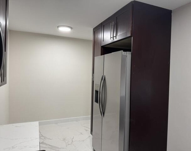 8801 Wiles Road - Photo Thumbnail 3
