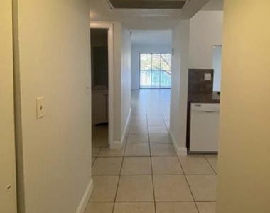 9000 Nw 28th Drive - Photo Thumbnail 1