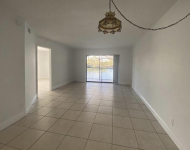 9000 Nw 28th Drive - Photo Thumbnail 2