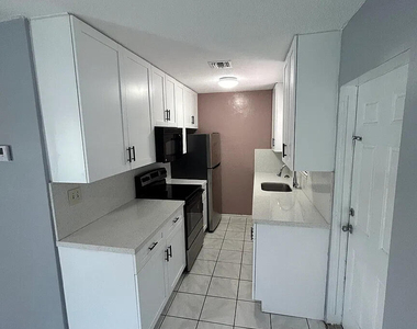5891 Ne 18th Avenue - Photo Thumbnail 1
