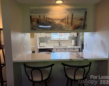 11001 Running Ridge Road - Photo Thumbnail 3