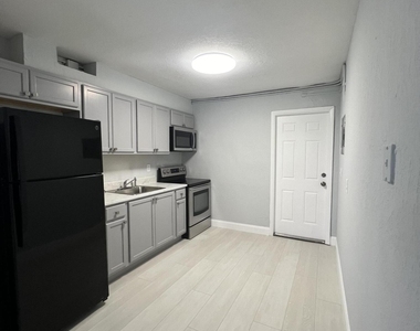 1273 W 34th Street - Photo Thumbnail 4