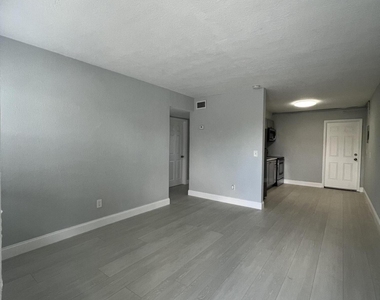 1273 W 34th Street - Photo Thumbnail 2