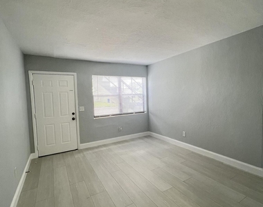 1273 W 34th Street - Photo Thumbnail 3