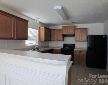 11701 Village Pond Drive - Photo Thumbnail 3