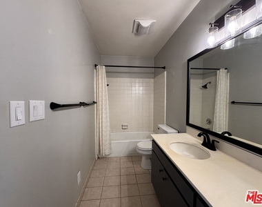 8701 Delgany Avenue - Photo Thumbnail 15