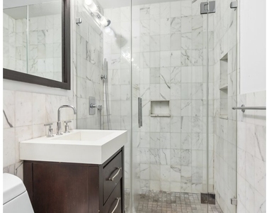 201 E 15th Street - Photo Thumbnail 5