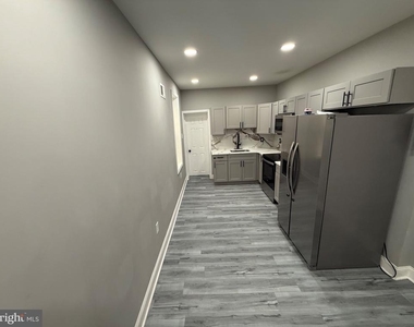 426 E 10th Street - Photo Thumbnail 2