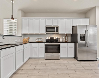 11315 Gadsen Ln - Photo Thumbnail 7