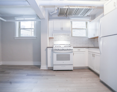 4649 N Manor Avenue - Photo Thumbnail 2