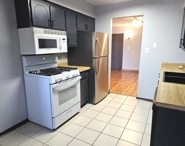 13615 Lamon Avenue - Photo Thumbnail 4