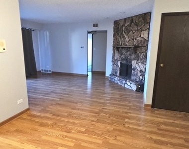 13615 Lamon Avenue - Photo Thumbnail 1