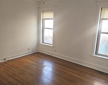 7014 S Crandon Avenue - Photo Thumbnail 4