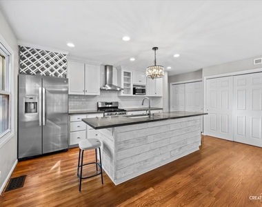 1114 S President Street - Photo Thumbnail 4