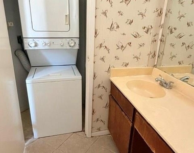 7901 Cambridge Street - Photo Thumbnail 3