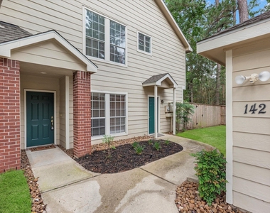 142 N Magnolia Pond Place - Photo Thumbnail 2