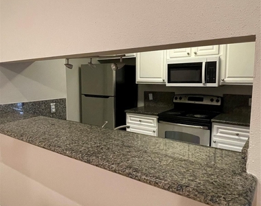 6601 Sands Point Drive - Photo Thumbnail 4