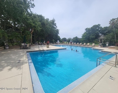 7667 N Wickham Road - Photo Thumbnail 2