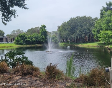 7667 N Wickham Road - Photo Thumbnail 1