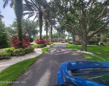 7667 N Wickham Road - Photo Thumbnail 3