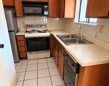 7901 Cambridge Street - Photo Thumbnail 4