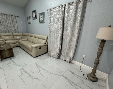 10411 Rainbow Oaks Drive - Photo Thumbnail 2