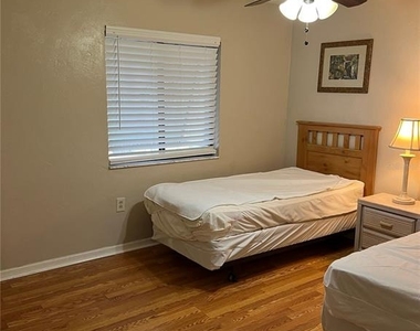 2777 N Poinciana Boulevard - Photo Thumbnail 2