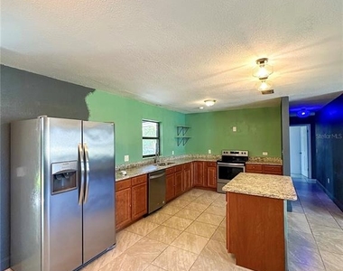 1302 Se 18th Place - Photo Thumbnail 6