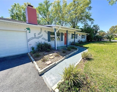1302 Se 18th Place - Photo Thumbnail 2