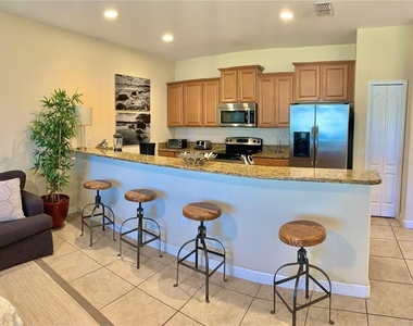 8921 Candy Palm Road - Photo Thumbnail 2